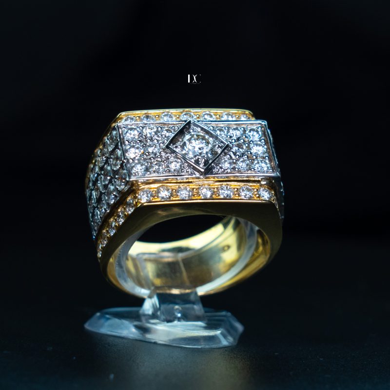 iced-out-diamond-ring-in-gold-and-silver-with-center-stone